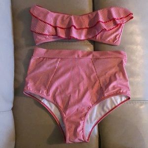 Red and white striped swim suit.